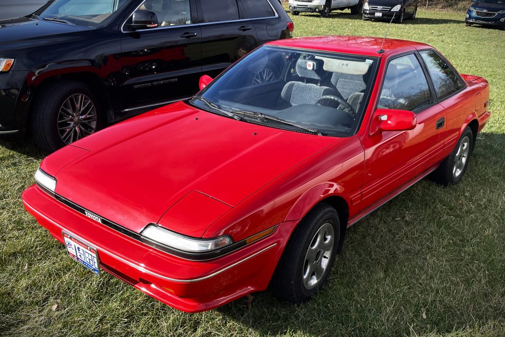 Vintage Red Toyota Corolla SR5, front