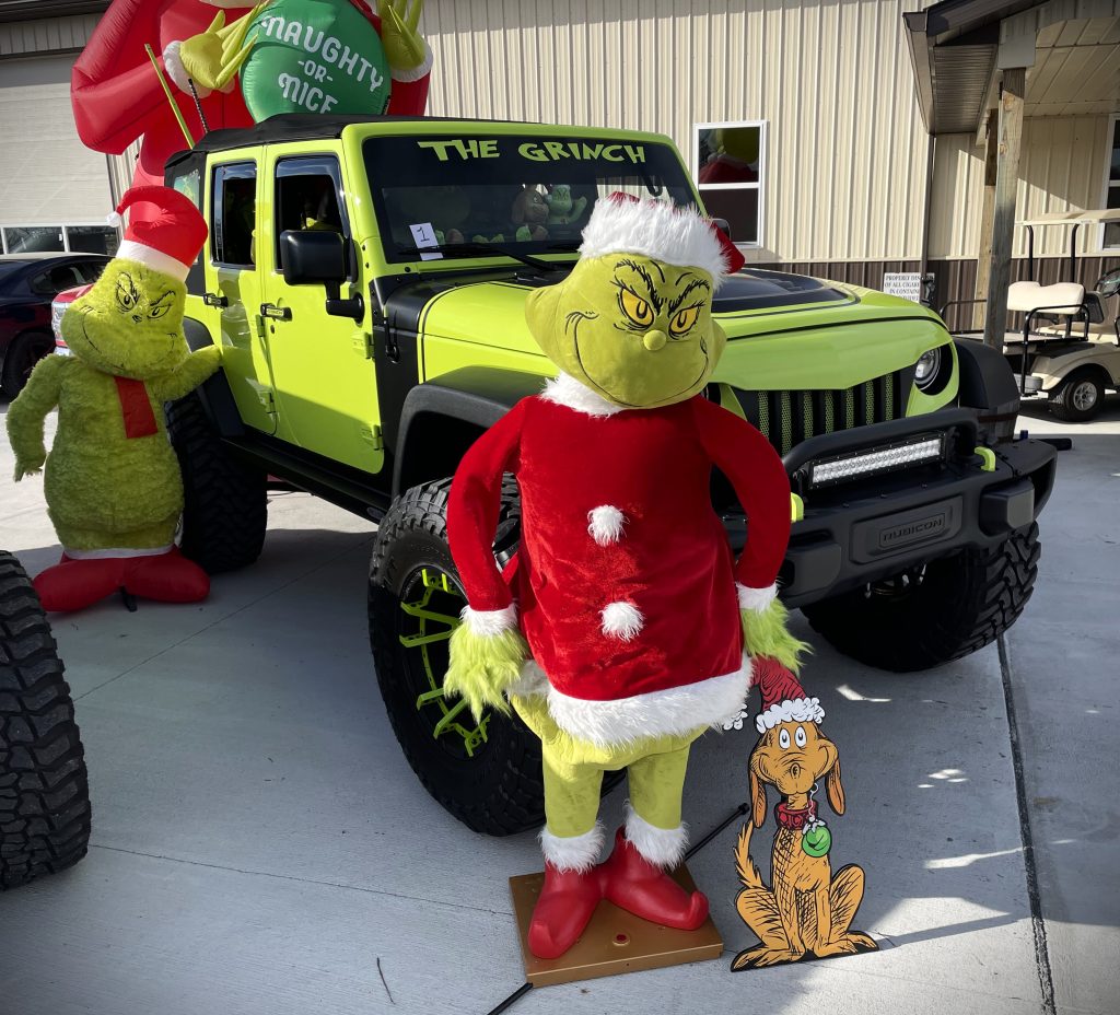 Grinch themed Jeep Wrangler with decorations