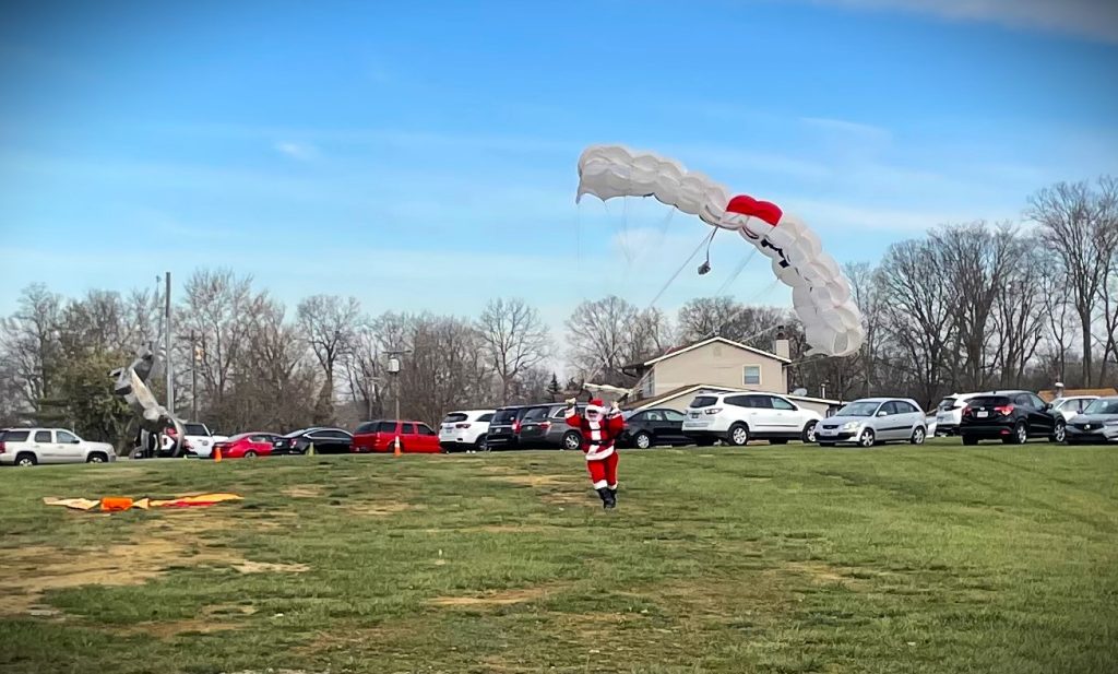 Santa on the ground after skydiving