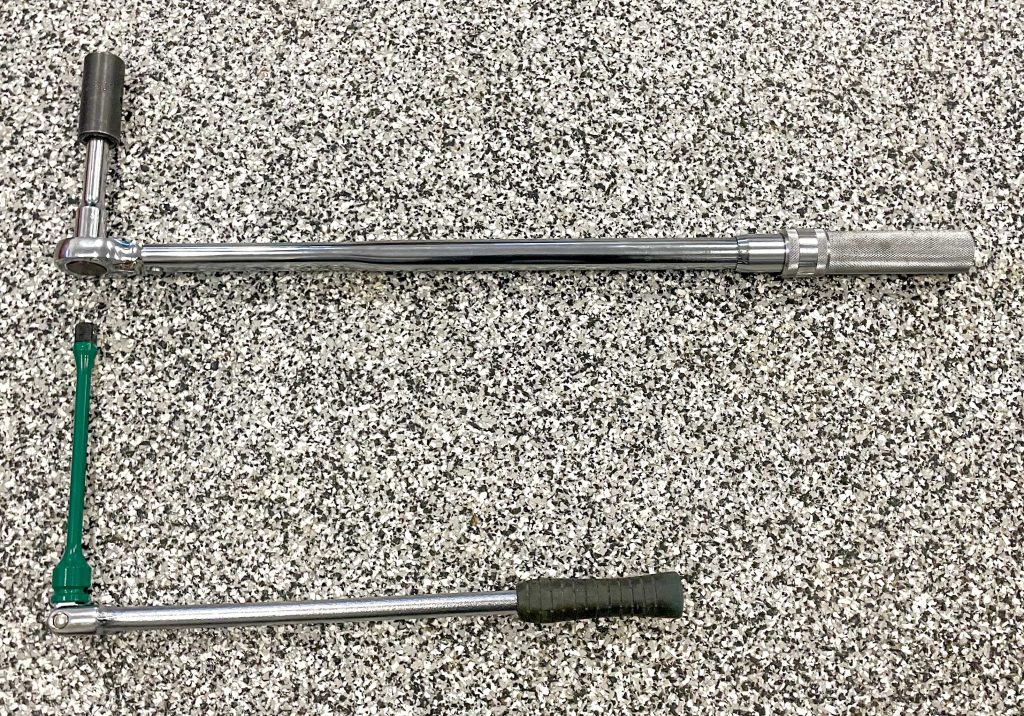 Breaker bar and torque wrench with torque extensions