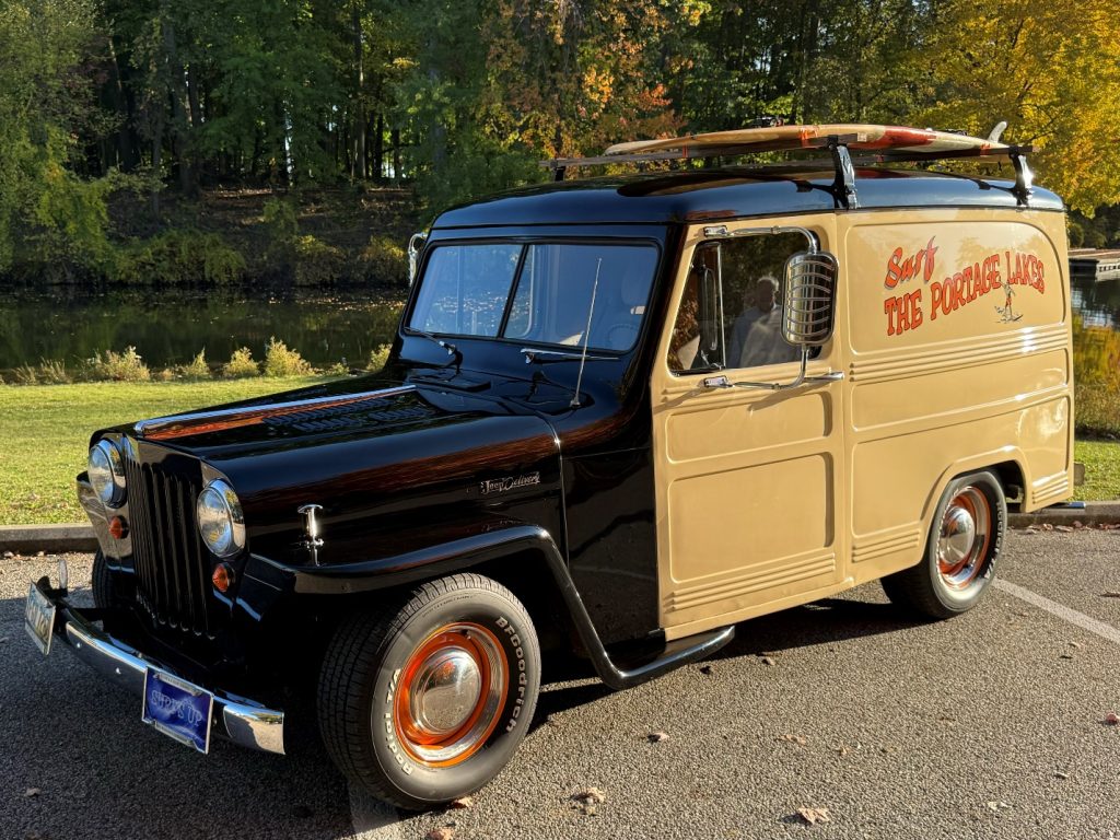 a custom 1948 Jeep Panel Wagon parked on roadside